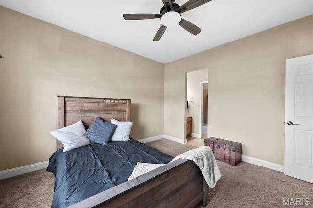 244 US Dr, Wentzville, MO 63385 - carpeted bedroom featuring baseboards, ceiling fan, and connected bathroom