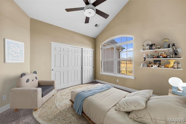 244 US Dr, Wentzville, MO 63385 - bedroom featuring baseboards, high vaulted ceiling, carpet floors, a closet, and ceiling fan