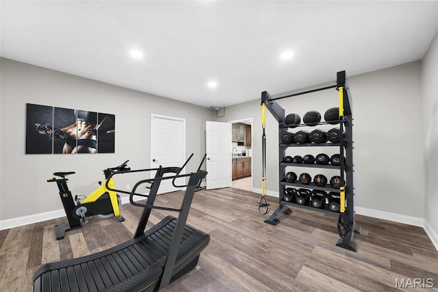244 US Dr, Wentzville, MO 63385 - exercise area with baseboards, wood finished floors, and recessed lighting