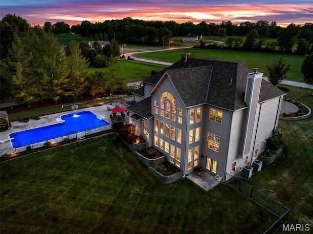 244 US Dr, Wentzville, MO 63385 - view from above of property featuring a pool area and a tree filled landscape