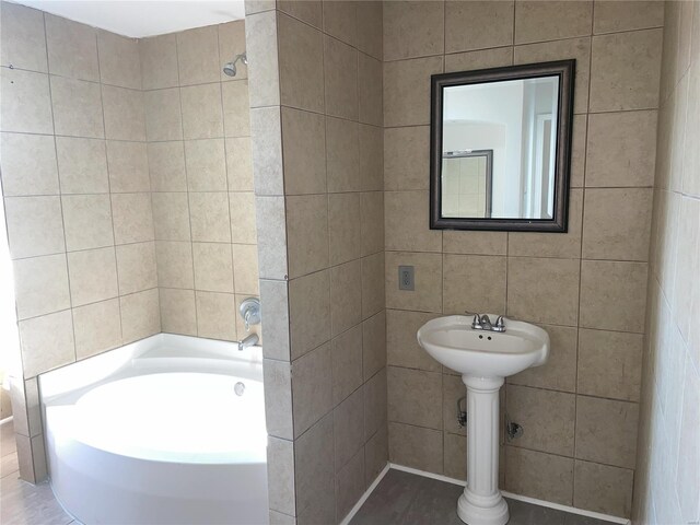 6817 Gravois Ave, Saint Louis, MO 63116 - full bathroom featuring a tub to relax in and a sink
