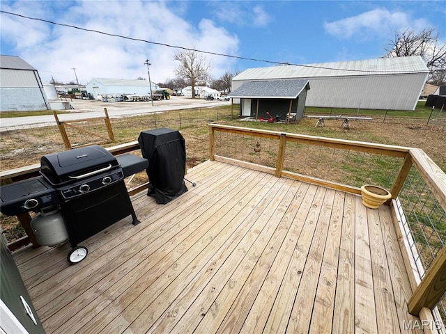 301 W Summer St, Monroe City, MO 63456 - deck with an outdoor structure and grilling area