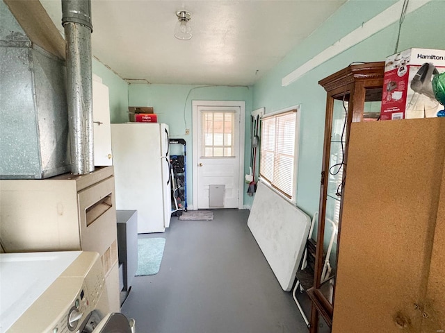 906 E Center St, Salem, MO 65560 - interior space featuring washer / clothes dryer and concrete floors