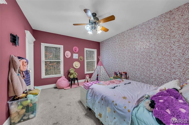 2942 Eagle Pointe Dr, Wentzville, MO 63385 - carpeted bedroom with an accent wall, ceiling fan, and wallpapered walls