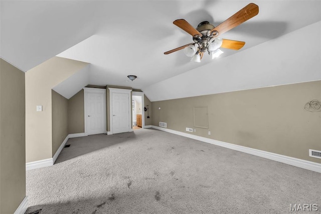 2942 Eagle Pointe Dr, Wentzville, MO 63385 - additional living space featuring vaulted ceiling, carpet flooring, and a ceiling fan
