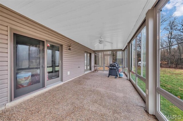 2942 Eagle Pointe Dr, Wentzville, MO 63385 - unfurnished sunroom with a ceiling fan