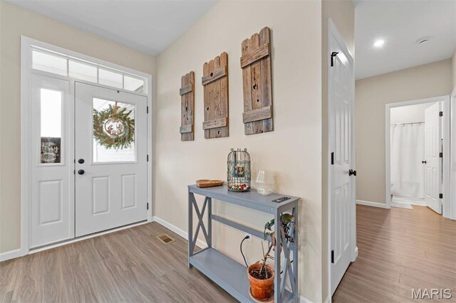 5 Spinney Bough Ct, Wentzville, MO 63385 - entryway featuring baseboards and wood finished floors