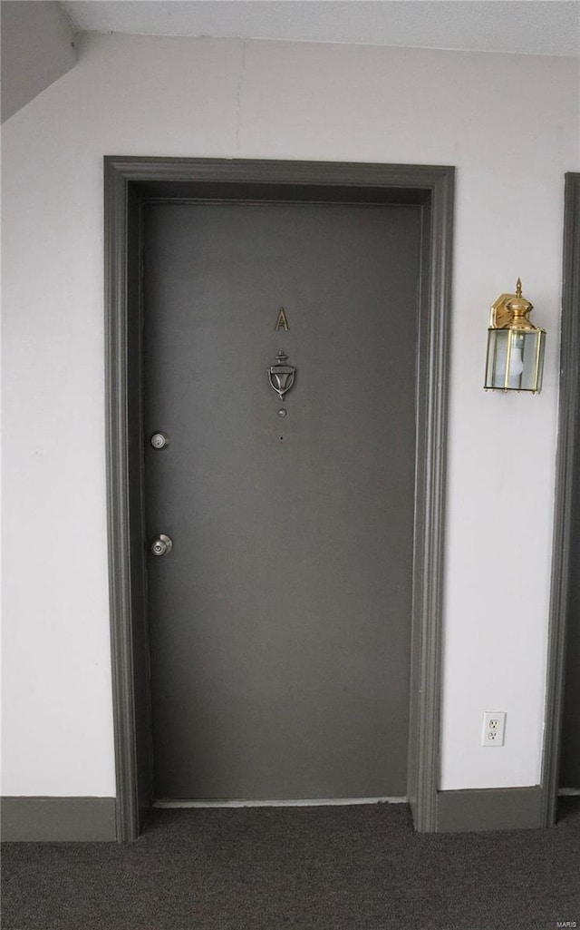 3181 Carefree Ln Unit A, Florissant, MO 63033 - doorway to property with stucco siding