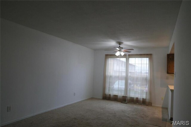 3181 Carefree Ln Unit A, Florissant, MO 63033 - carpeted spare room featuring a ceiling fan and baseboards