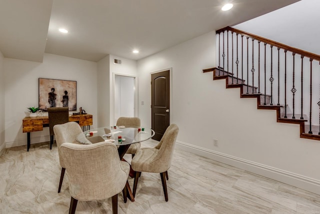 1029 Lami, Saint Louis, MO 63104 - dining space with stairway, baseboards, and recessed lighting