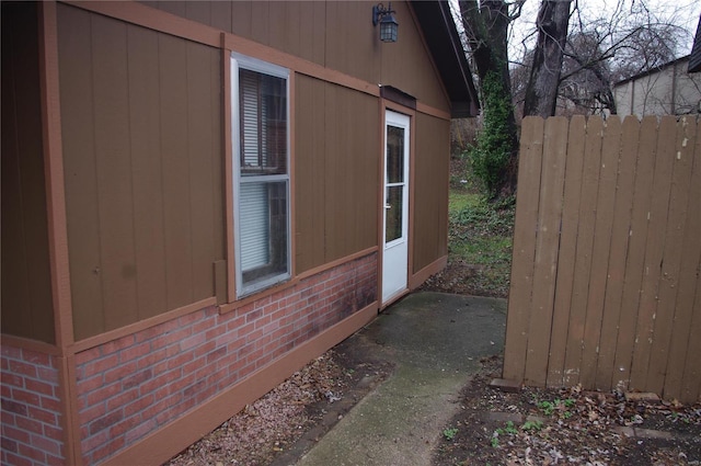 25 N 44th St, Belleville, IL 62226 - view of property exterior featuring brick siding and fence