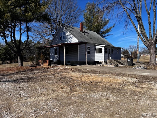 901 Edgemont Blvd, Perryville, MO 63775 - view of front of home featuring a chimney and covered porch