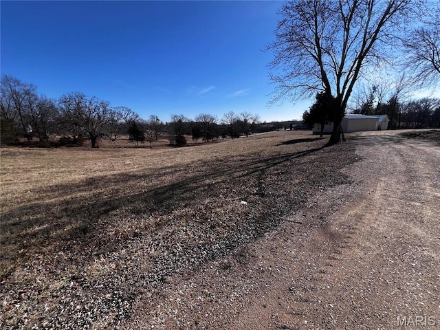 901 Edgemont Blvd, Perryville, MO 63775 - view of dirt / gravel road featuring a view of rural / pastoral area