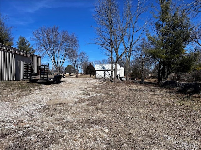 901 Edgemont Blvd, Perryville, MO 63775 - view of yard with an outdoor structure and a pole building