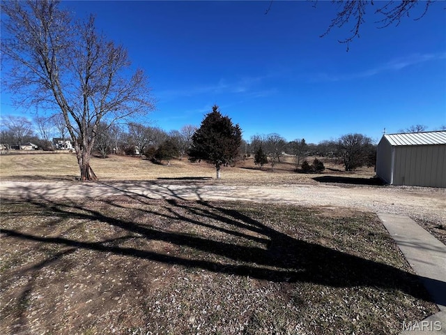 901 Edgemont Blvd, Perryville, MO 63775 - view of yard featuring an outbuilding and a storage unit