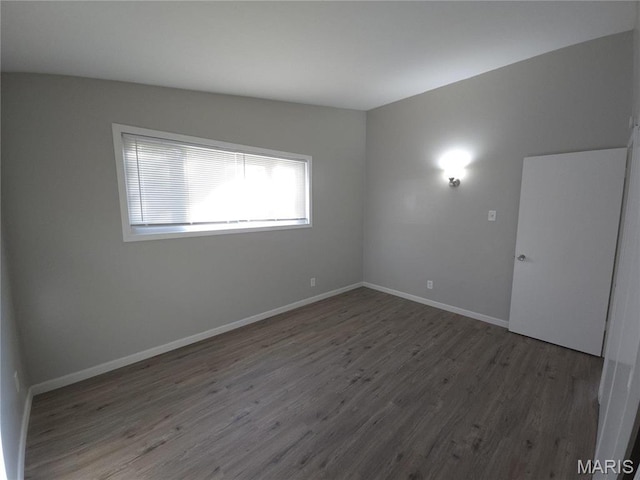 10468 Halls Ferry Rd, Saint Louis, MO 63136 - unfurnished room with wood finished floors and baseboards