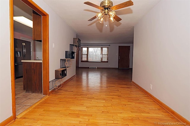 820 Sharon Dr, Cape Girardeau, MO 63701 - hallway featuring light wood-style flooring and baseboards