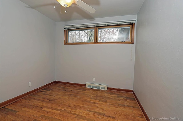 820 Sharon Dr, Cape Girardeau, MO 63701 - spare room with a ceiling fan, wood finished floors, and baseboards
