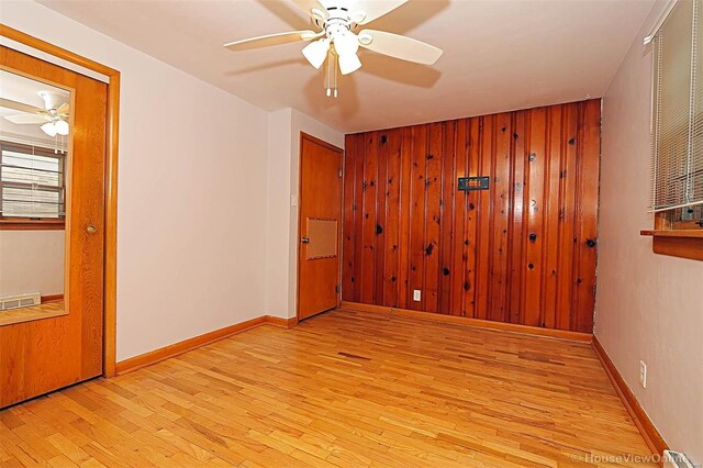 820 Sharon Dr, Cape Girardeau, MO 63701 - spare room featuring a ceiling fan, light wood finished floors, and baseboards