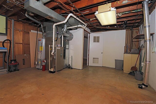 820 Sharon Dr, Cape Girardeau, MO 63701 - unfinished basement featuring water heater and heating unit