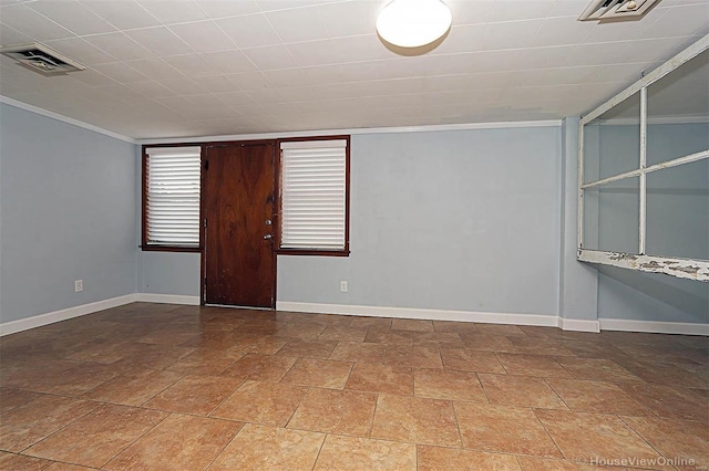 820 Sharon Dr, Cape Girardeau, MO 63701 - spare room featuring crown molding, baseboards, and stone finish floors
