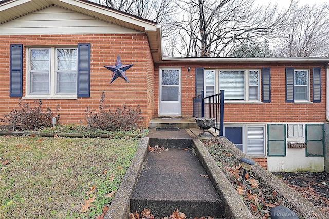 820 Sharon Dr, Cape Girardeau, MO 63701 - doorway to property with brick siding