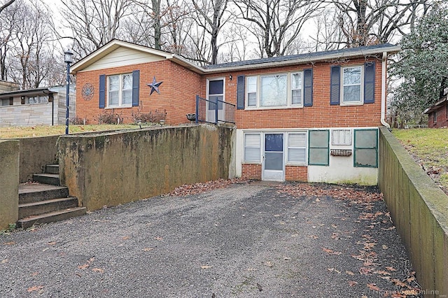 820 Sharon Dr, Cape Girardeau, MO 63701 - view of front of property with brick siding and fence