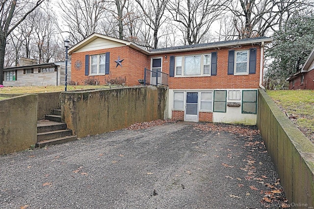 820 Sharon Dr, Cape Girardeau, MO 63701 - view of front of house featuring brick siding and fence
