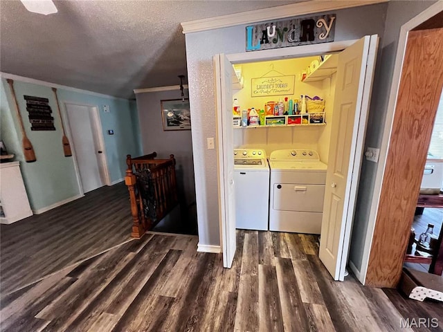 1034 Port Perry Dr, Perryville, MO 63775 - laundry area with separate washer and dryer, dark wood-style flooring, crown molding, a textured ceiling, and baseboards