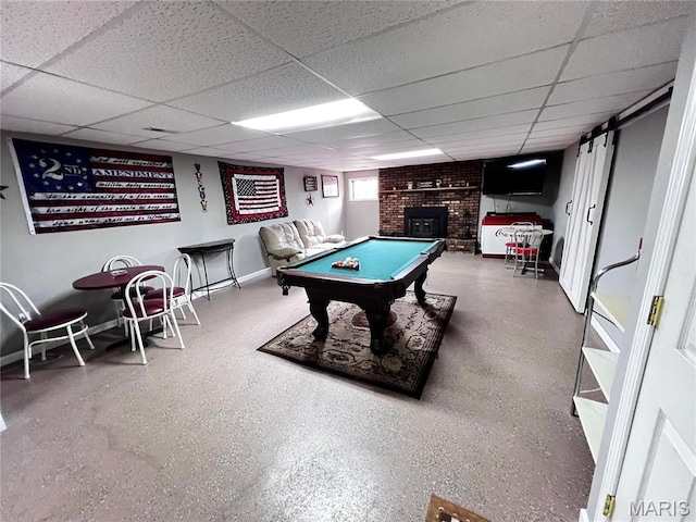1034 Port Perry Dr, Perryville, MO 63775 - rec room featuring billiards table, a drop ceiling, a fireplace, and baseboards