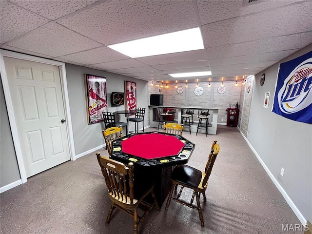 1034 Port Perry Dr, Perryville, MO 63775 - game room featuring baseboards, a paneled ceiling, and a bar