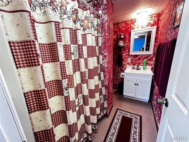 1034 Port Perry Dr, Perryville, MO 63775 - full bath featuring wallpapered walls and vanity