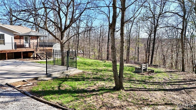 1034 Port Perry Dr, Perryville, MO 63775 - view of yard featuring a shed, an outdoor structure, and a wooden deck