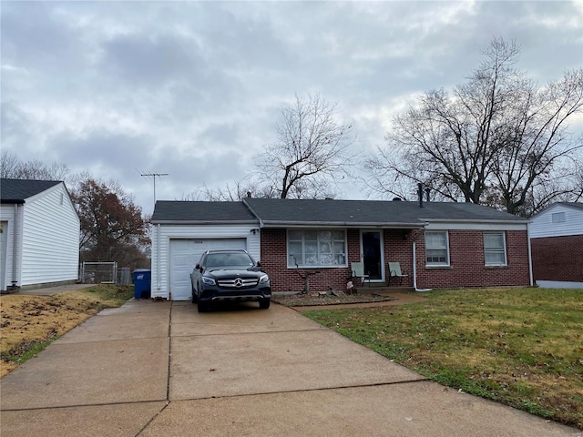 10634 Alliance Dr, Saint Louis, MO 63136 - ranch-style house with a garage, brick siding, concrete driveway, and a front lawn