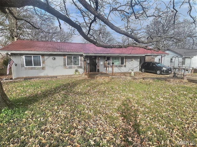 813 Kendall Dr, Poplar Bluff, MO 63901 - ranch-style house with a metal roof and a front yard