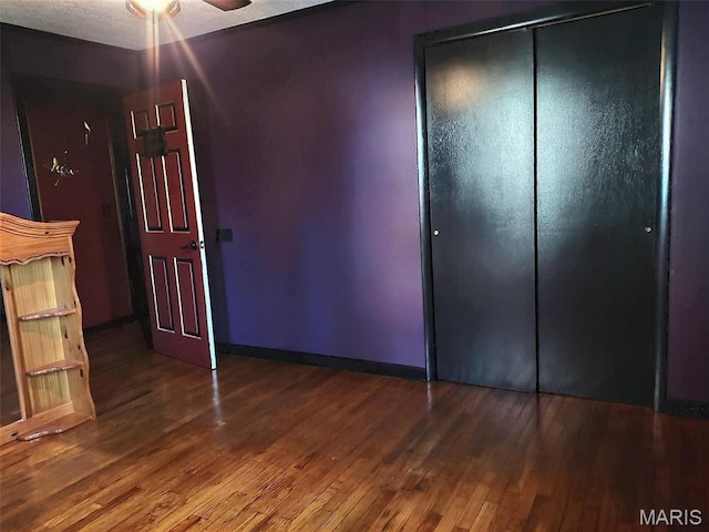 813 Kendall Dr, Poplar Bluff, MO 63901 - unfurnished bedroom with hardwood / wood-style flooring and a closet