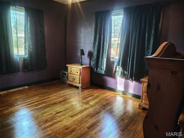 813 Kendall Dr, Poplar Bluff, MO 63901 - bedroom with wood finished floors and baseboards