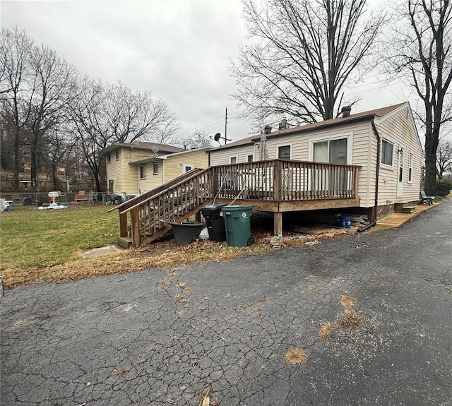 320 Geyer Rd, Kirkwood, MO 63122 - manufactured / mobile home featuring a wooden deck, a chimney, and a front lawn