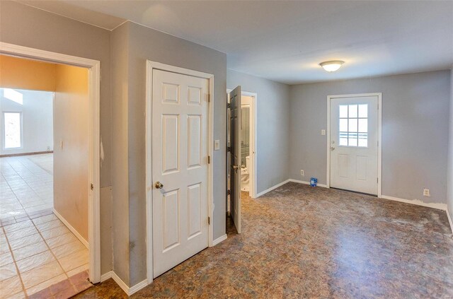 6866 Frandsen Rd, Alhambra, IL 62001 - carpeted foyer entrance featuring baseboards