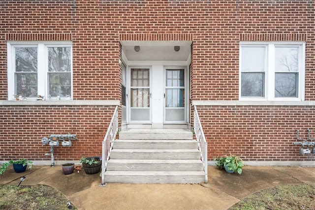 4201 Walsh St, Saint Louis, MO 63116 - doorway to property featuring brick siding and french doors