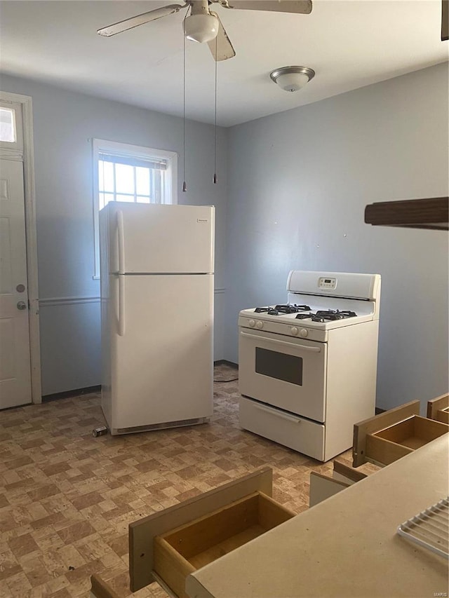 4201 Walsh St, Saint Louis, MO 63116 - kitchen featuring white appliances, ceiling fan, and light flooring