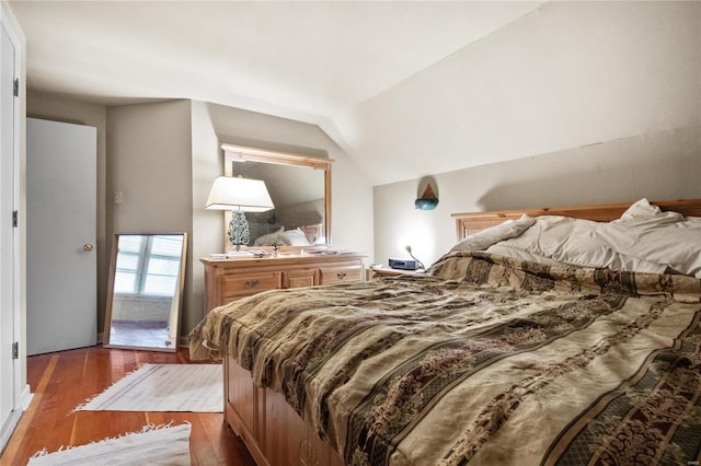 10319 Cable Ave, Frontenac, MO 63131 - bedroom featuring wood finished floors and vaulted ceiling