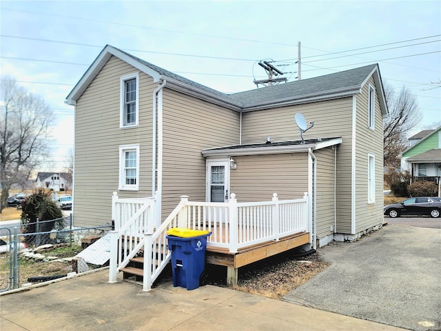 305 Macarthur St, Washington, MO 63090 - back of property featuring fence and a deck