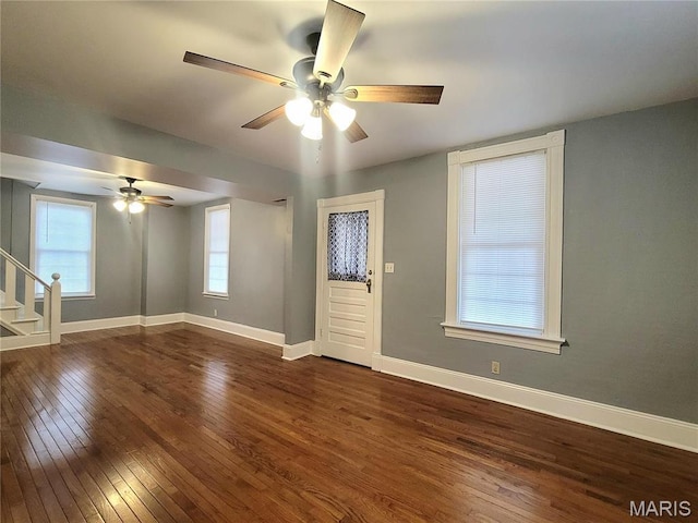 305 Macarthur St, Washington, MO 63090 - empty room featuring hardwood / wood-style floors, a ceiling fan, and stairs