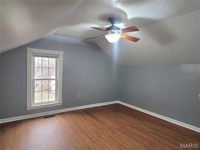 305 Macarthur St, Washington, MO 63090 - additional living space featuring dark wood-style floors, ceiling fan, and vaulted ceiling