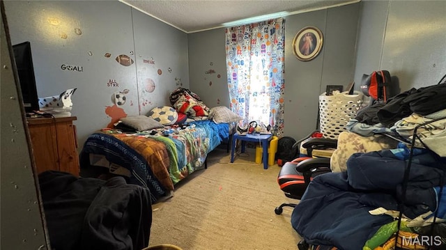 bedroom with a textured ceiling, carpet flooring, and crown molding