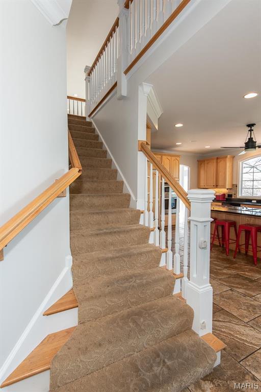 2314 Longest Dr, Wentzville, MO 63385 - stairway featuring recessed lighting and stone finish flooring