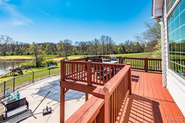 2314 Longest Dr, Wentzville, MO 63385 - wooden terrace with a water view, view of wooded area, and a patio