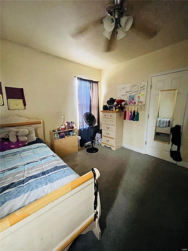 4934 W Florissant Ave, Saint Louis, MO 63115 - bedroom featuring carpet flooring, a ceiling fan, and baseboards