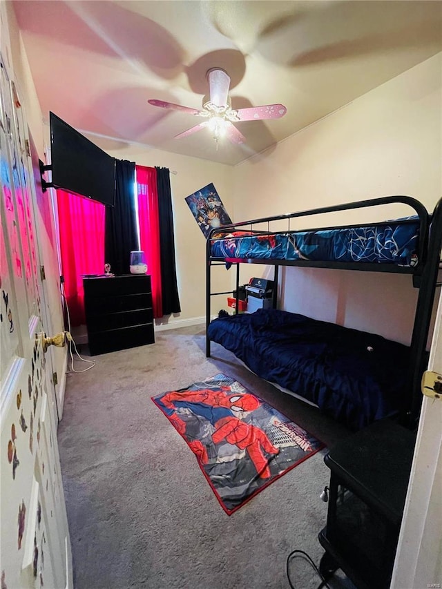 4934 W Florissant Ave, Saint Louis, MO 63115 - bedroom featuring carpet floors and ceiling fan